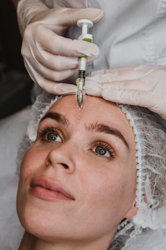 woman-getting-facial-beauty-injection-wellness-center