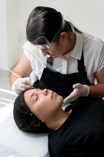 young-woman-going-through-microblading-procedure